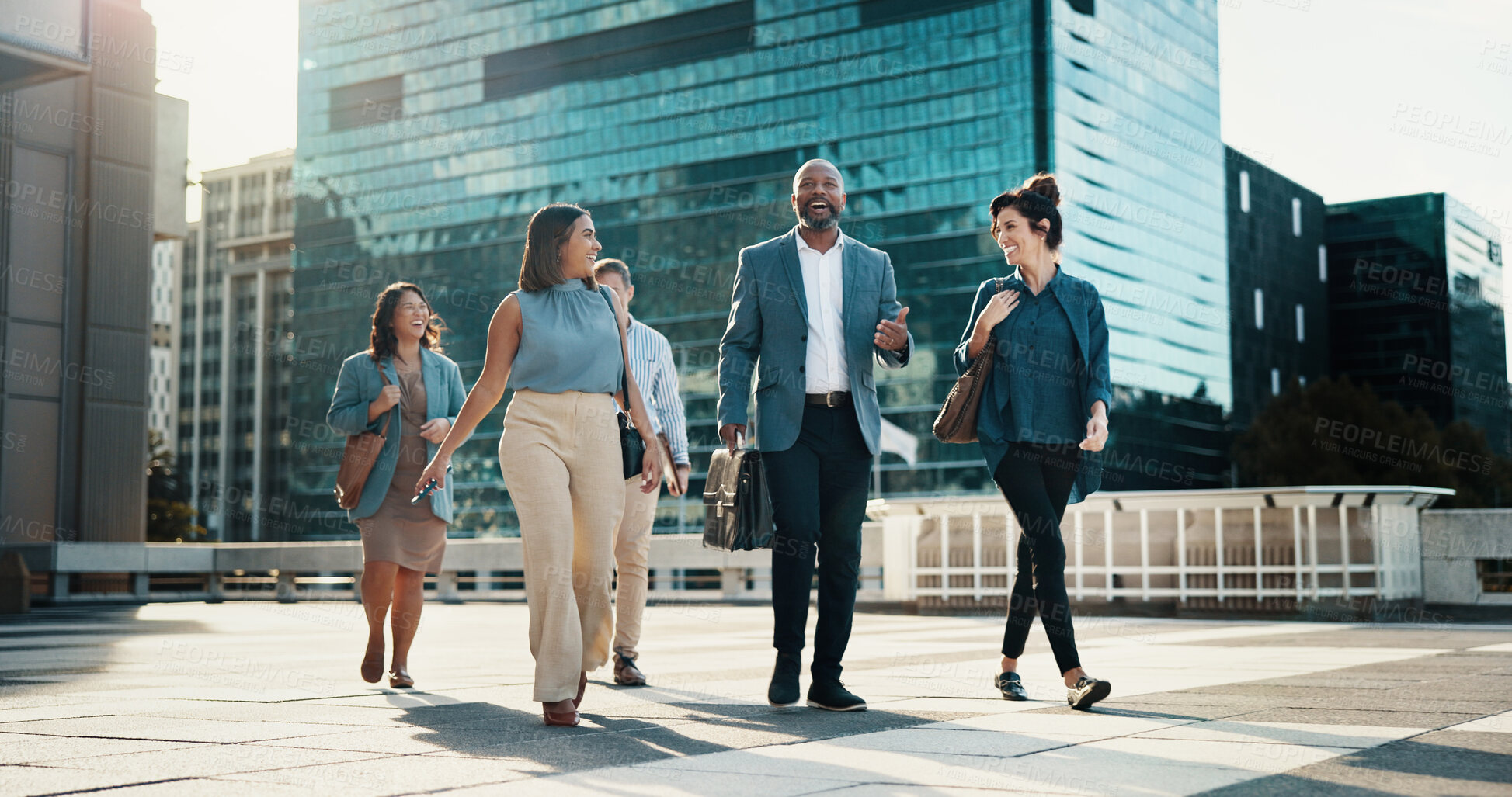 Buy stock photo Professional, walking and business people in city in discussion on morning commute, travel and journey. Corporate, teamwork and men and women in town talking for collaboration, meeting and career