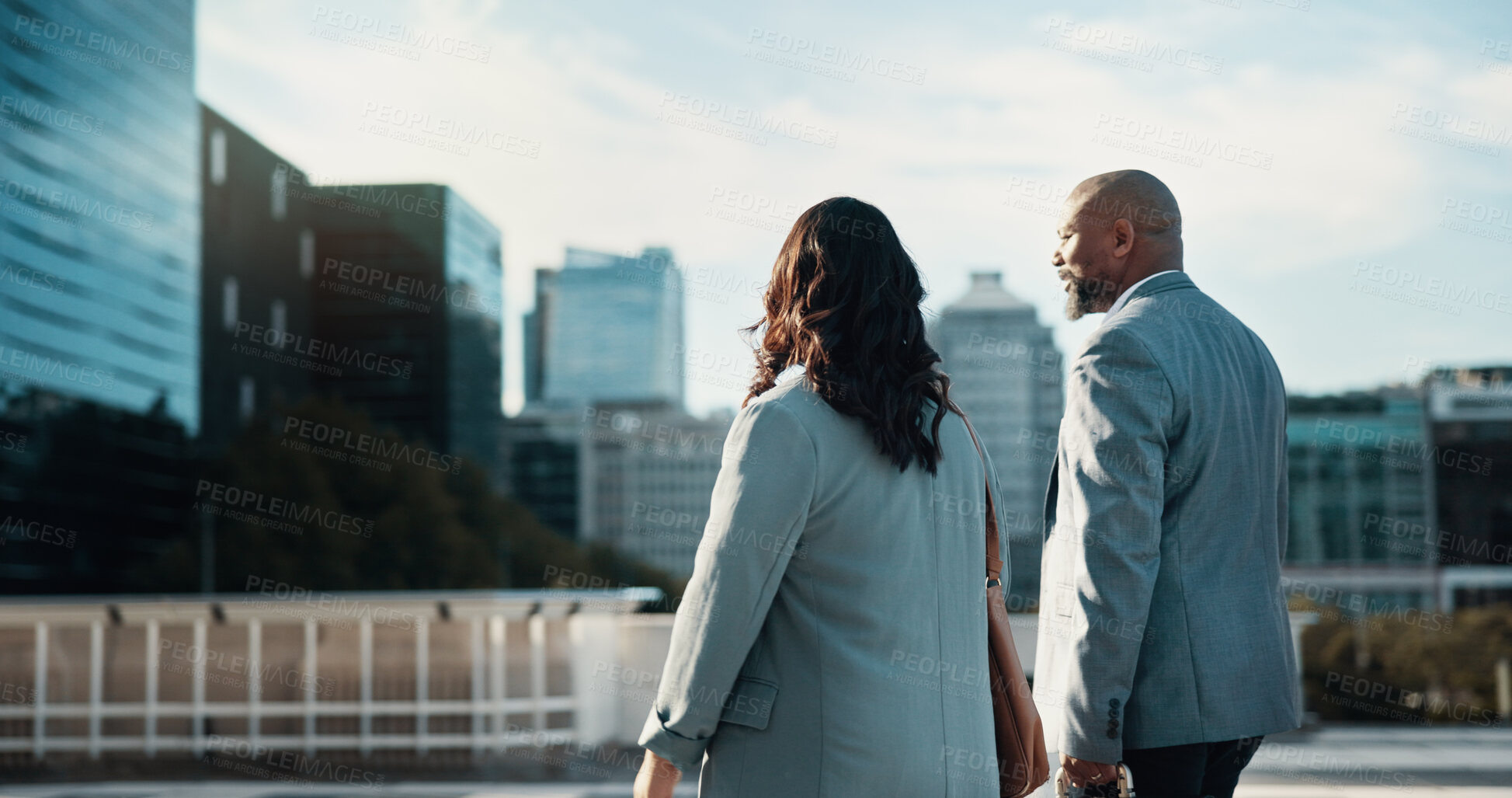 Buy stock photo Back, commute and collaboration with business people in city together for travel to work. Building, direction or walking with man and woman corporate employee team outdoor in urban town for journey