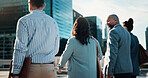 Back, commute and group with business people in city together for travel to work. Building, collaboration or walking with man and woman corporate employee team outdoor in urban town for journey