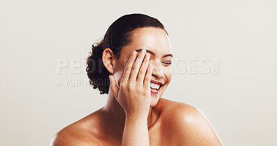 Buy stock photo Beauty, skincare and woman with cosmetics, funny and dermatology on white studio background. Person, mockup space and model with wellness, glow and healthy skin with acne treatment, smile or laughing