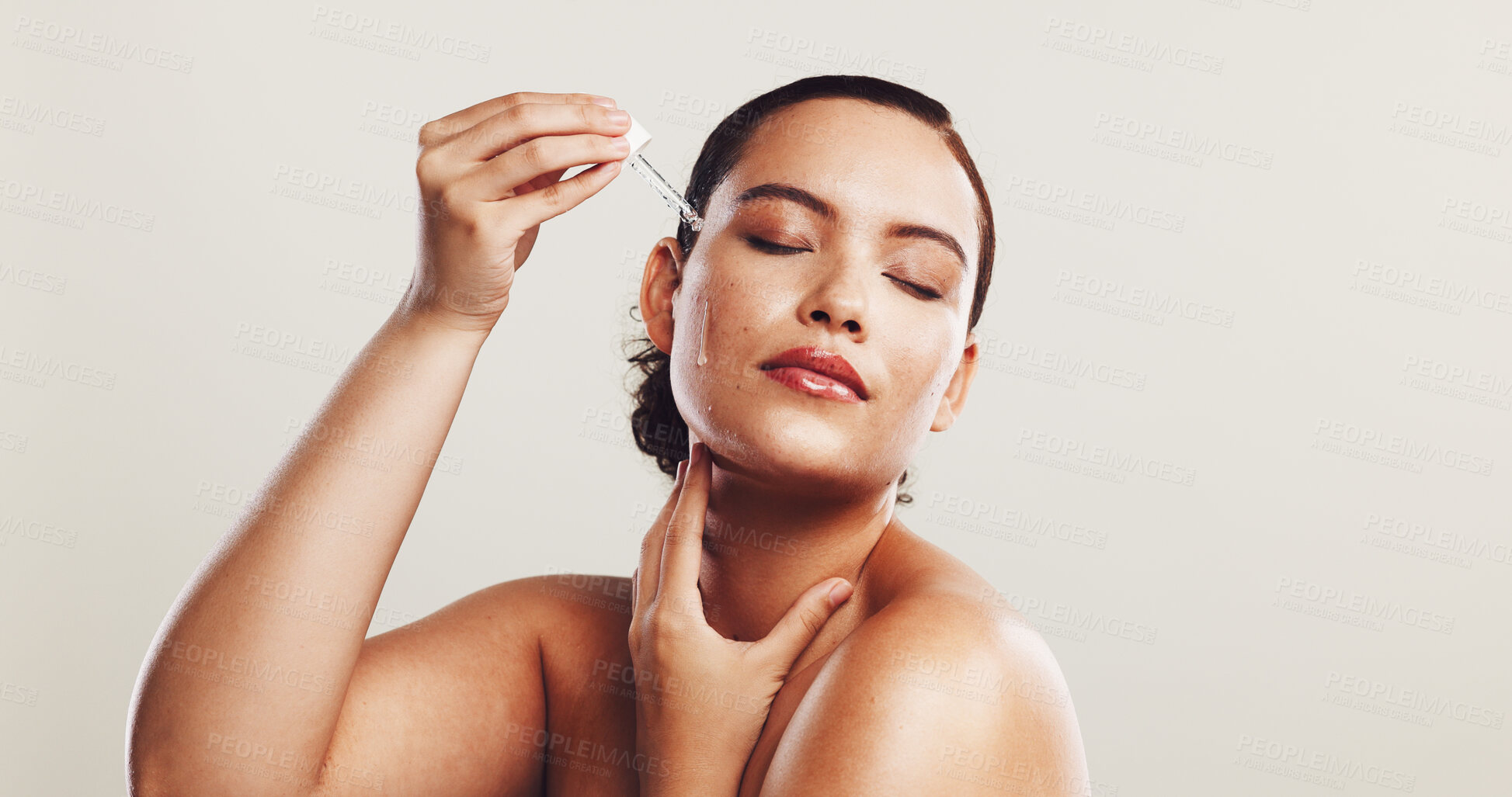 Buy stock photo Girl, pride and skincare serum in studio for facial treatment, collagen benefits and dermatology. Person, eyes closed and oil product with self care, hyaluronic acid and hydration on white background