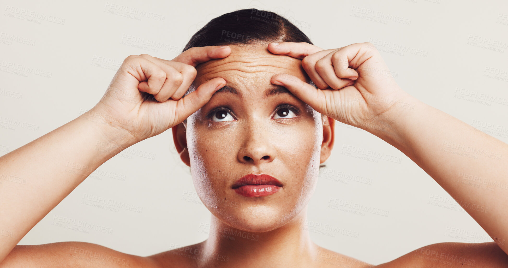 Buy stock photo Wrinkles, forehead and woman with skincare, dermatology and plastic surgery on white studio background. Person, worry and model with cosmetic facial filler, wellness and health with beauty or concern