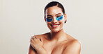 Happy woman, portrait and eye patches with collagen for beauty or anti aging treatment on a white studio background. Face, female person or model with smile for hydration or dermatology on mockup