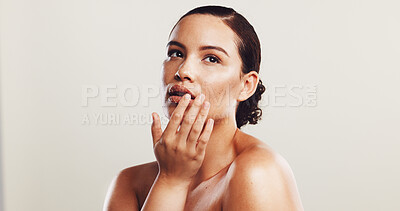 Buy stock photo Beauty, skincare and woman with cosmetics, shine and dermatology on white studio background. Person, mockup space and model with confidence, wellness and healthy skin with acne treatment and glow
