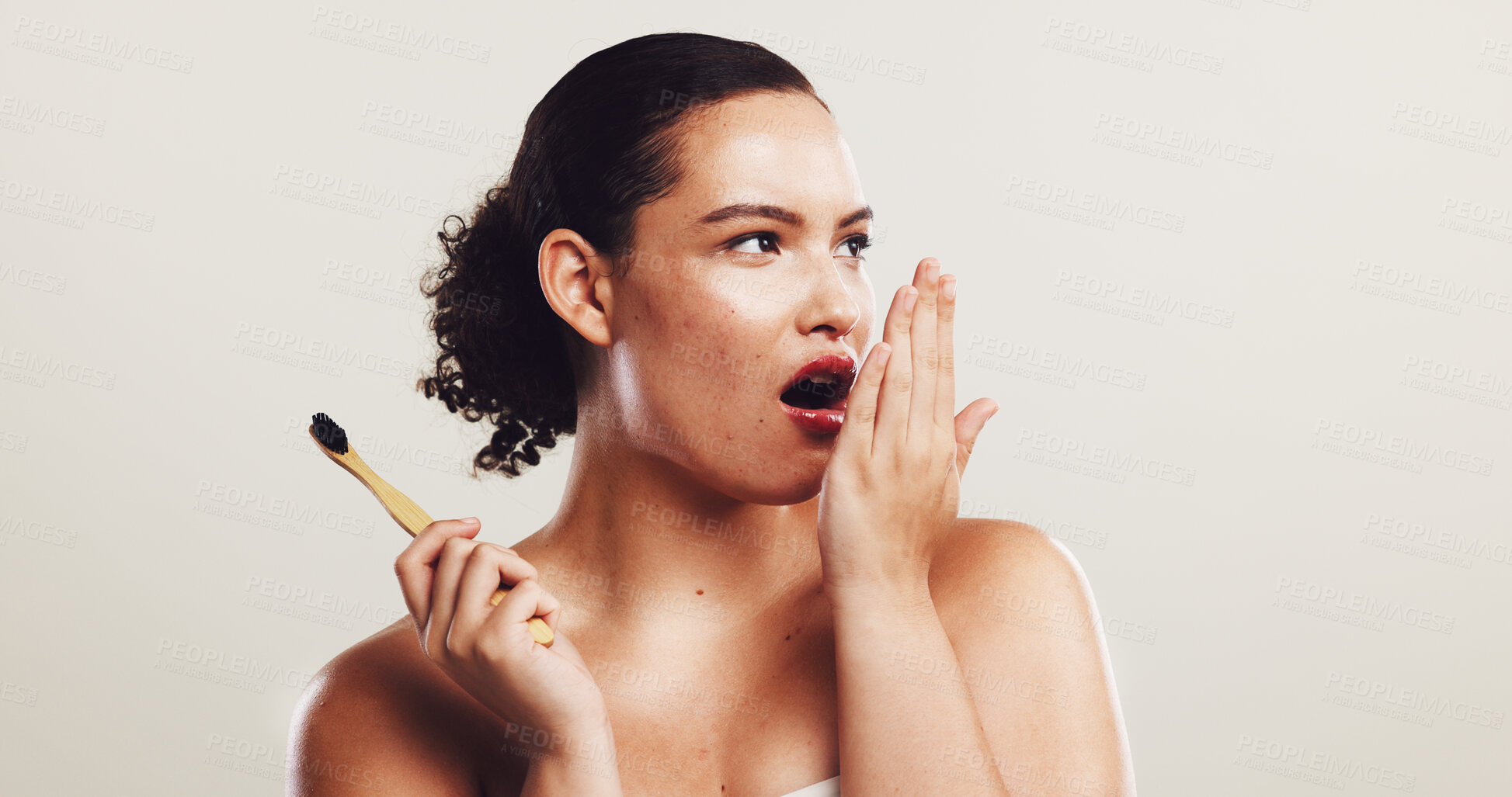Buy stock photo Woman, bamboo and toothbrush with fresh breath in studio for dental hygiene or morning on a white background. Female person, model or smell with oral or mouth care for gum disease, germs or bacteria