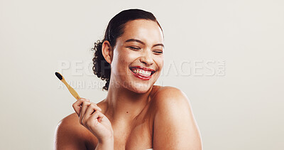 Buy stock photo Happy woman, bamboo and toothbrush with dental hygiene in studio for morning routine on a white background. Female person, young model or smile with teeth for oral, mouth or gum care on mockup space