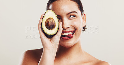 Buy stock photo Avocado, skincare and woman in studio with collagen organic and natural face routine. Beauty, dermatology and female person with fruit for facial moisturizing treatment with glow by white background.