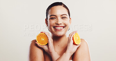 Buy stock photo Orange, beauty and portrait of woman in studio with natural, organic and vitamin c face routine. Skincare, dermatology and female person with citrus fruit for facial brightening by white background.
