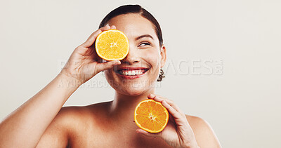 Buy stock photo Happy woman, beauty or skincare with orange for citrus detox or vitamin C on a white studio background. Female person, model or smile with natural organic fruit for healthy skin or nutrition on space