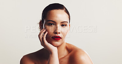 Buy stock photo Makeup, woman and portrait with lipstick in studio, cosmetics and confidence by mockup space. Calm, female person and model with smooth change for beauty, treatment and wellness by white background
