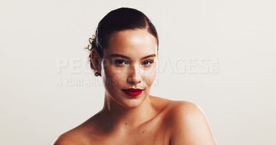 Buy stock photo Woman, portrait and makeup with lipstick in studio, cosmetics and confidence by mockup space. Calm, female person and model with smooth change for beauty, treatment and wellness by white background