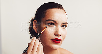 Buy stock photo Eyeshadow, brush and makeup with woman in studio for beauty product, self care and cosmetics. Tools, aesthetic and salon with person on white background for powder, glow treatment and glamour