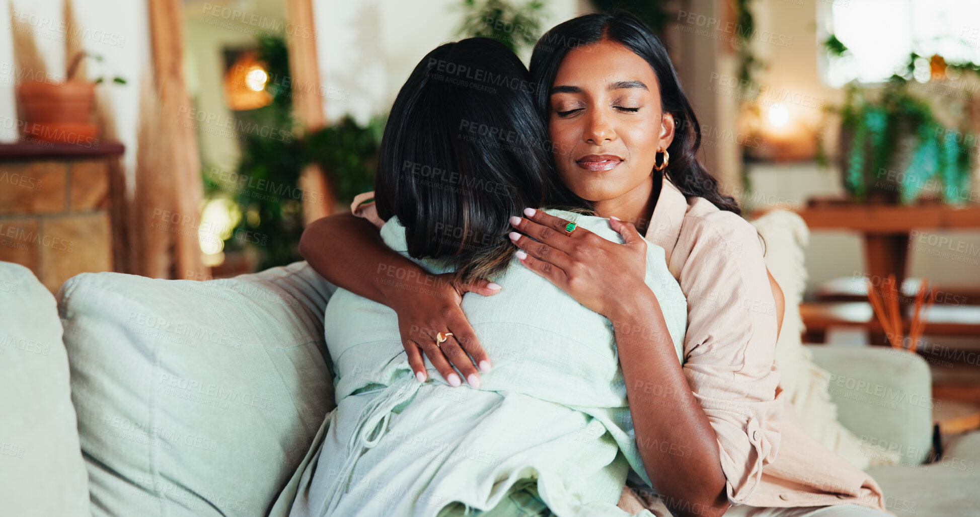 Buy stock photo Women, friends and hug with support for comfort, love or trust with solidarity in living room. People, bonding and embrace for welcome, communication and care in home lounge for reunion and empathy