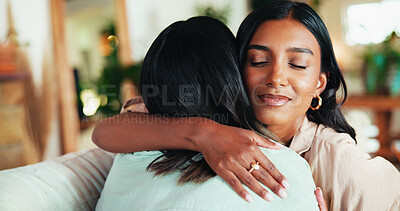 Buy stock photo Women, friends and hug with welcome for comfort, love or trust with congratulations in living room. Happy people, support and embrace for bonding, good news and care in home lounge for reunion 