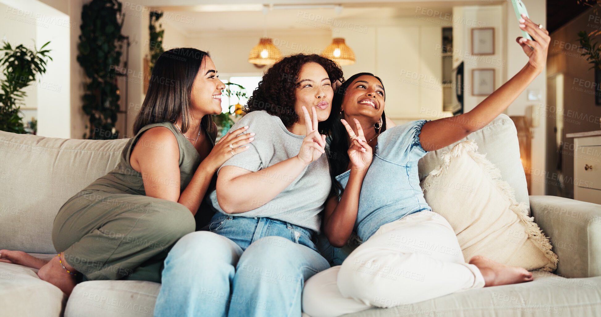 Buy stock photo Women, friends and peace sign with selfie on sofa for social media, bonding and together at home. Female people, group and picture with love for friendship, memories and fun reunion on couch at house