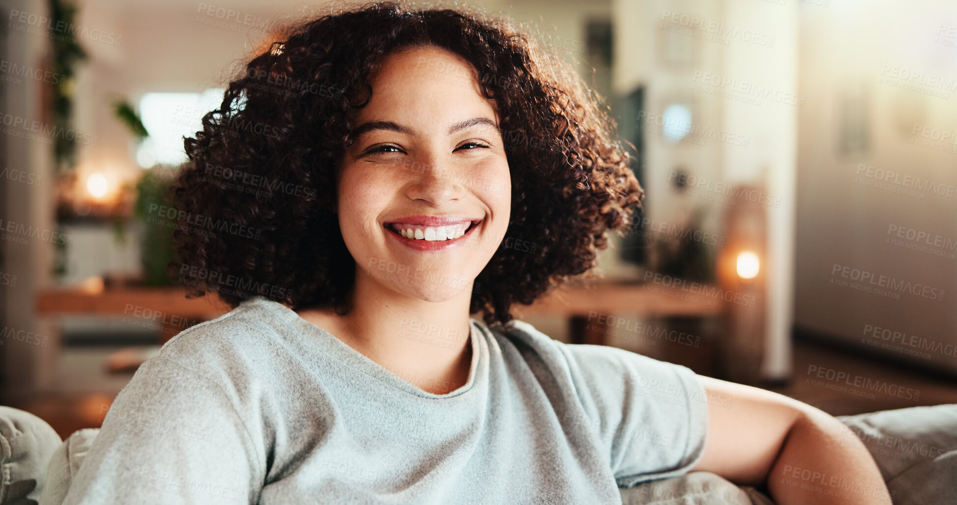 Buy stock photo Portrait, happy woman and relax in house for calm, peace and comfortable on weekend. Face, smile and female person on sofa in home for chill, resting and student on break at university in Mexico