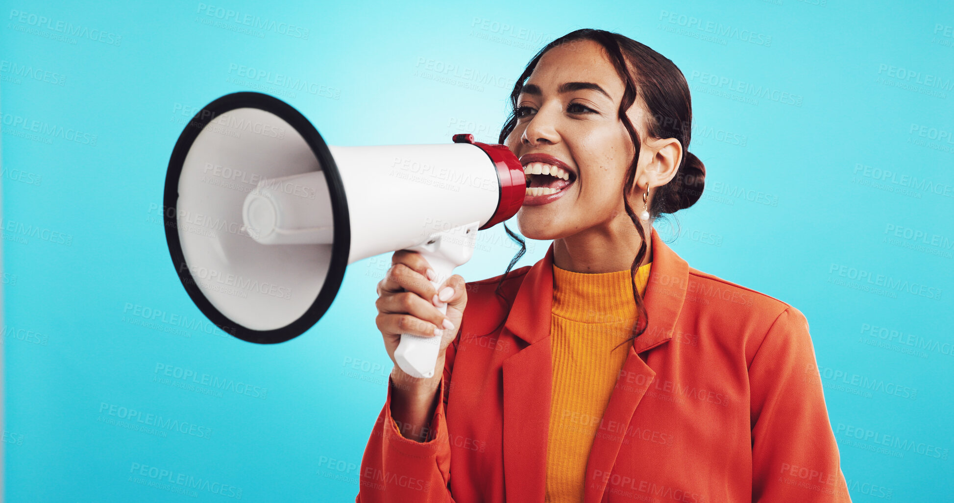 Buy stock photo Woman, speaker and protest news in studio, propaganda and human rights rally on blue background. Government, broadcast information and megaphone for speech, revolution and person for announcement