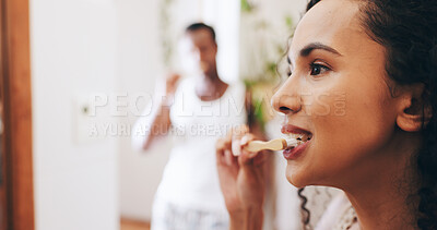 Buy stock photo Bathroom, brushing teeth and woman with toothbrush in morning for dental care, mouth hygiene and cleaning. Health, home and couple with toothpaste for oral wellness, whitening and grooming routine