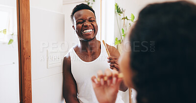 Buy stock photo Bathroom, brushing teeth and couple with toothbrush in home for dental care, mouth hygiene and cleaning. Health, morning routine and man and woman with smile for oral wellness, fresh and grooming
