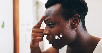 Buy stock photo Skincare, face cream and black man in bathroom for facial treatment, cosmetics and spa product. Beauty, morning and person with lotion, spf and moisturizer for wellness, healthy skin and grooming