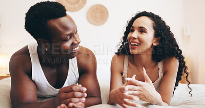 Buy stock photo Talking, happy and couple in bedroom in morning for relaxing, conversation and bonding in hotel. Marriage, relationship and man with woman on bed for affection, commitment and valentines day