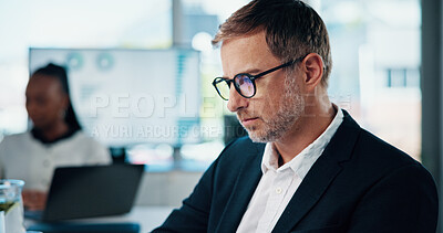 Buy stock photo Reading, analysis or mature businessman in meeting for finance, tax research or debt management. Investment banker, analyst or advisor with professional review, financial account or report update