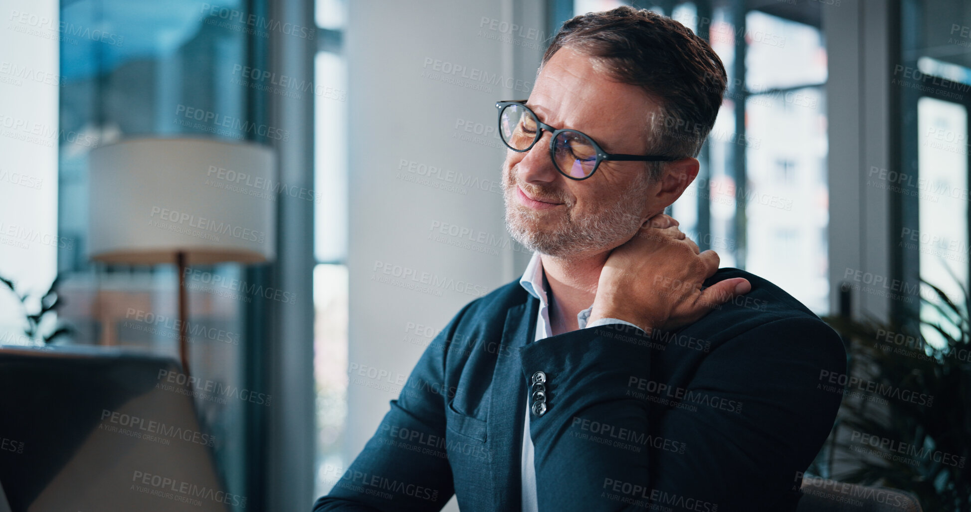 Buy stock photo Burnout, laptop and neck pain with business man in office administration, deadline or report. Computer, injury or stress and mature employee in workplace with cramp, discomfort or muscle stiffness
