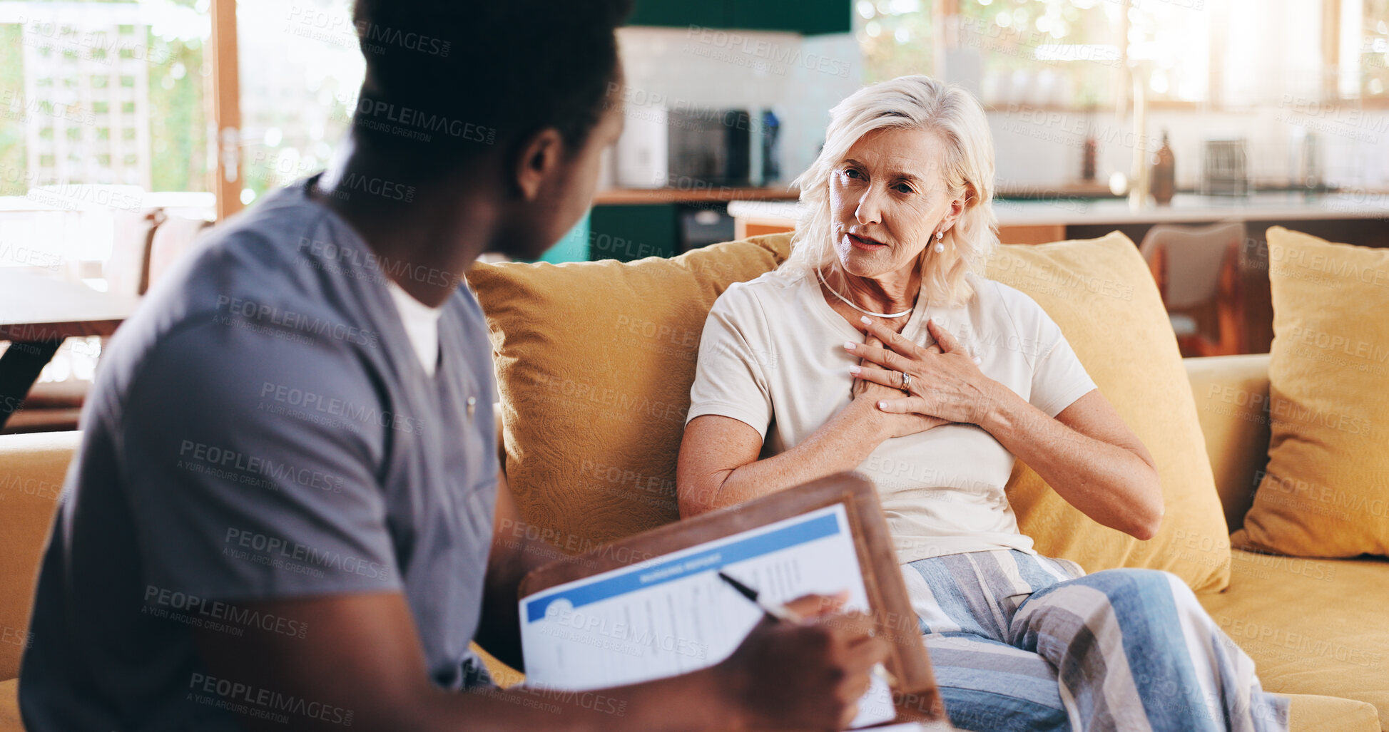 Buy stock photo Woman, nurse and talking with documents for checkup procedure, medical questions and healthcare survey. Mature patient, caregiver and paperwork for information, diagnosis notes and treatment at house