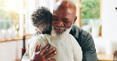 Buy stock photo Mature, happy couple and hug with love for embrace, support or bonding moment together at home. Senior man, woman or lovers with smile, comfort or affection for relief, emotional healing or feeling
