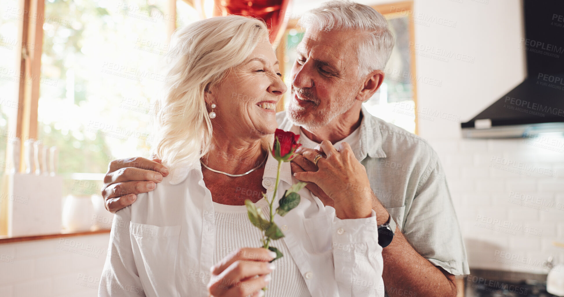 Buy stock photo Happy, house and senior couple with flower, romance and bonding together for Valentines day. Marriage, mature man and old woman with rose, present and relationship with celebration for anniversary
