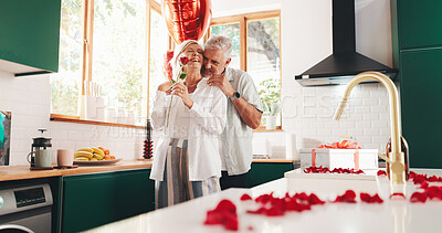 Buy stock photo Elderly couple, flowers and valentines day in home, gift and enjoy romantic conversation with happy wife. Old people, affection and support with present for healthy marriage, anniversary and love