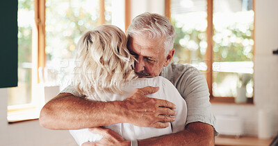 Buy stock photo Senior couple, hug and love in home, smile and enjoying reunion with happy husband in kitchen. Elderly people, romance and support to connect for healthy marriage, commitment and retirement embrace
