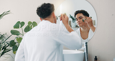 Buy stock photo Mirror, man and face roller for skincare, self care and morning in home bathroom. Beauty, jade stone and reflection with cosmetics for facial massage, treatment and blood circulation for dermatology