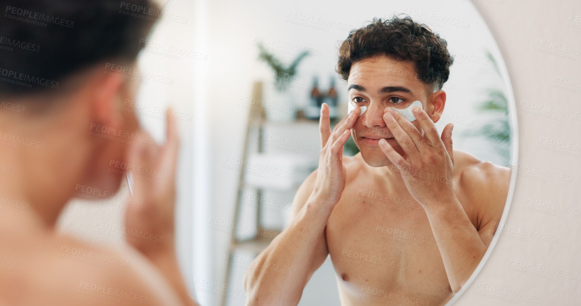 Buy stock photo Bathroom, skincare or man with mirror, eye patch or cosmetics for beauty, application or wellness. Reflection, home or person with facial collagen pads, anti aging dermatology product or hydration