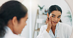 Dermatology, mirror and woman in bathroom, skincare and confidence with routine, grooming and beauty. Person, house and girl with reflection, makeup and cosmetics with wellness and acne treatment