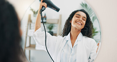 Buy stock photo Woman, blow dryer and hair care by mirror for frizz control, heat treatment or smile for daily routine. Home, female person or happy with electric appliance for style, texture or growth by reflection