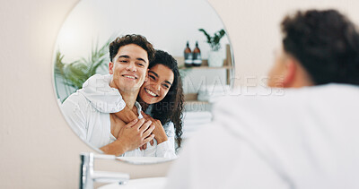 Buy stock photo Happy couple, mirror and bathroom with hug for morning routine, hygiene or skincare together at home. Man, woman or lovers with smile, reflection or embrace for grooming, love or spa day at house