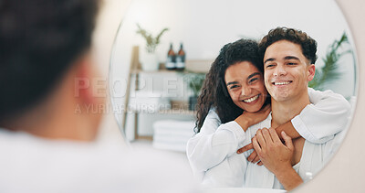 Buy stock photo Happy couple, mirror and bathroom with hug for hygiene, skincare or morning routine together at home. Man, woman or lovers with smile, reflection or embrace for grooming, love or spa day at house