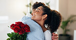 Roses, gift or couple hug for valentines day with love, support or smile for gratitude in home. Giving, thank you or people with bouquet of flowers for romantic present, anniversary or celebration