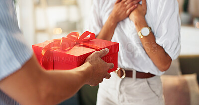 Buy stock photo Love, gift and box with hands of couple for valentines day celebration, romance or bonding. Relationship, care and surprise with man and woman at home for support, connection or present together