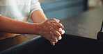Person, hands and washing with soap for cleaning, rinse or bacteria and germ removal at home. Closeup, cleaner or maid with disinfectant or handwash in sink for skincare, anti bacterial at house