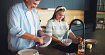 Father, girl and washing dishes in home with bowl disinfection, helping and learning responsibility. Happy family, man and teenage daughter cleaning with support, bonding together and kitchen hygiene