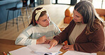 Girl, mom and help with homework, listening or support for development with education in living room. Child, mother and daughter with guide, teaching or problem solving for assessment in family house