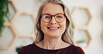 Happy woman, portrait or mature manager in hotel lobby for accommodation, hospitality or luxury lodge. Face, confidant or concierge with smile, pride or welcome for motel, resort or check in services