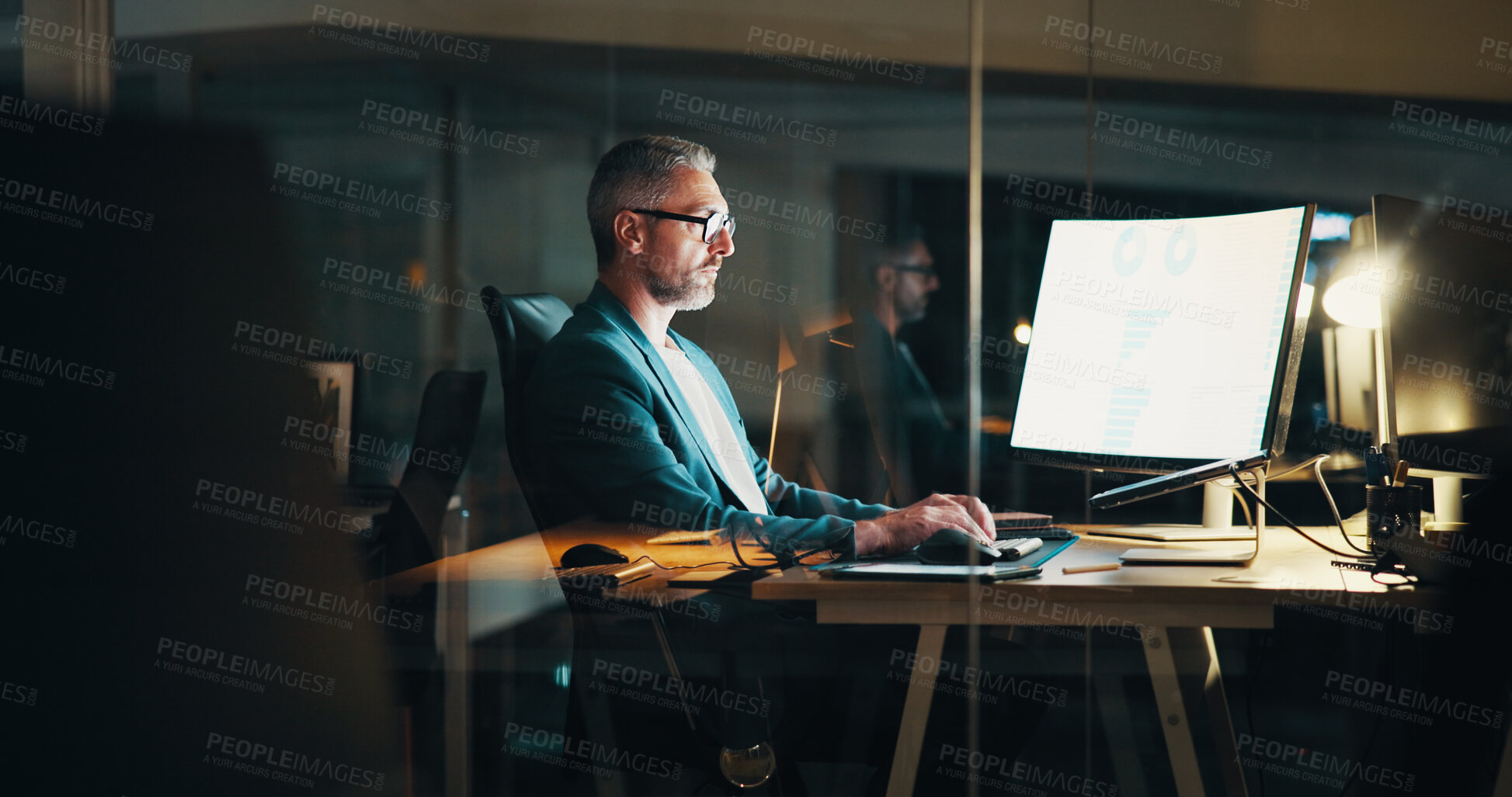 Buy stock photo Office, night and mature businessman on computer with statistics for finance report, research and analytics. Corporate, company and person working late for financial planning, review and fintech