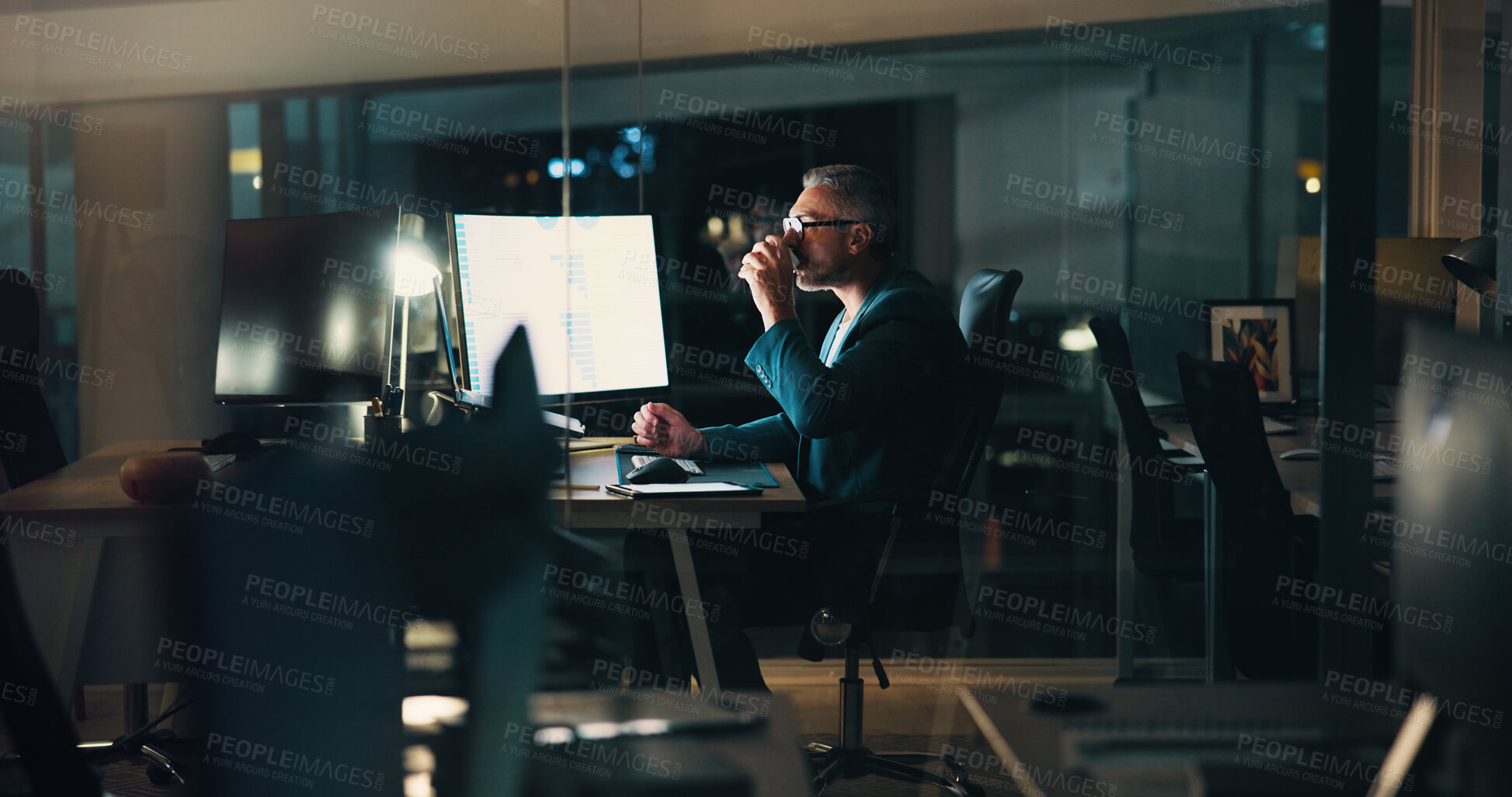 Buy stock photo Office, night and businessman on computer with coffee for finance report, research and analytics. Corporate, caffeine drink and person working late for financial planning, stock trading and fintech