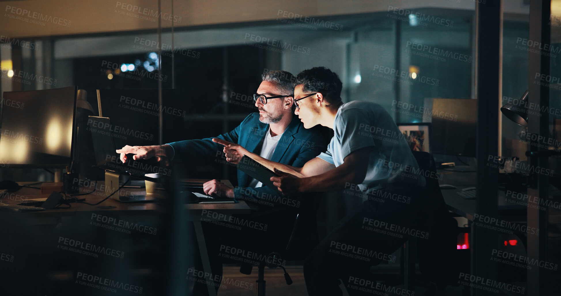 Buy stock photo Overtime, teamwork or business people on computer for finance, economic news or investment growth. Mentorship, night or financial analysts pointing to research, stocks report or account for deadline