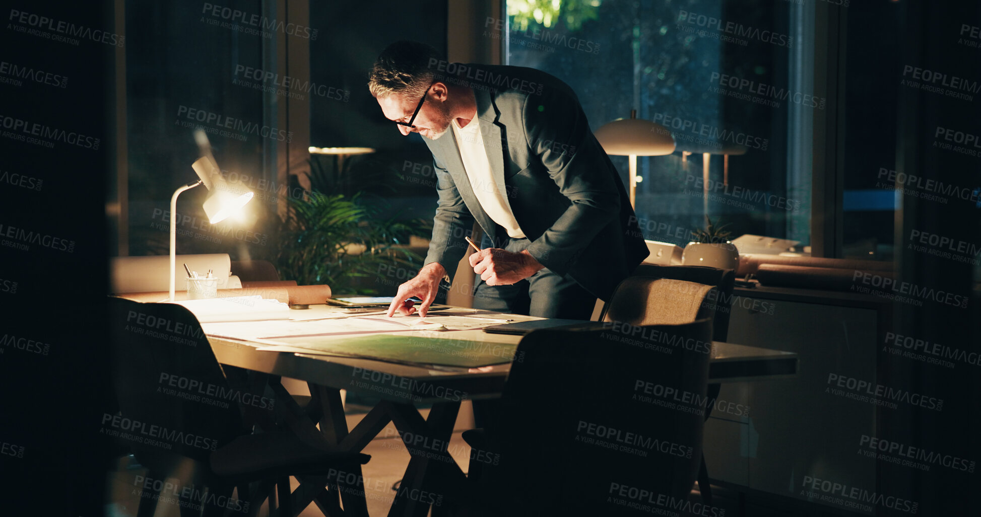 Buy stock photo Architecture, night and business man drawing for urban planning, property design and floorplan. Creative agency, working late and architect with layout, blueprint and paperwork for building project