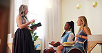 Women, therapist and mentor with tablet or interns for presentation, therapy session or lesson at office. Female people, coaching and training with junior employees for psychiatry course or workshop