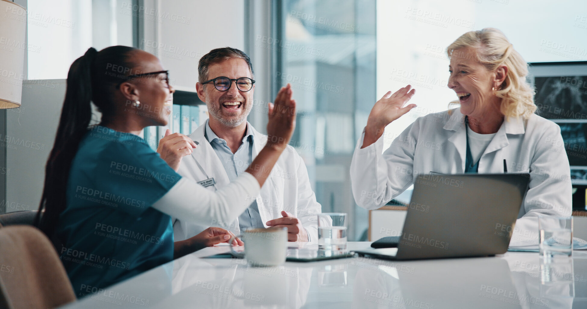 Buy stock photo Hospital, teamwork and doctors high five in meeting for consulting, discussion and medical success. Healthcare, excited and man and women on computer for collaboration, research or telehealth website